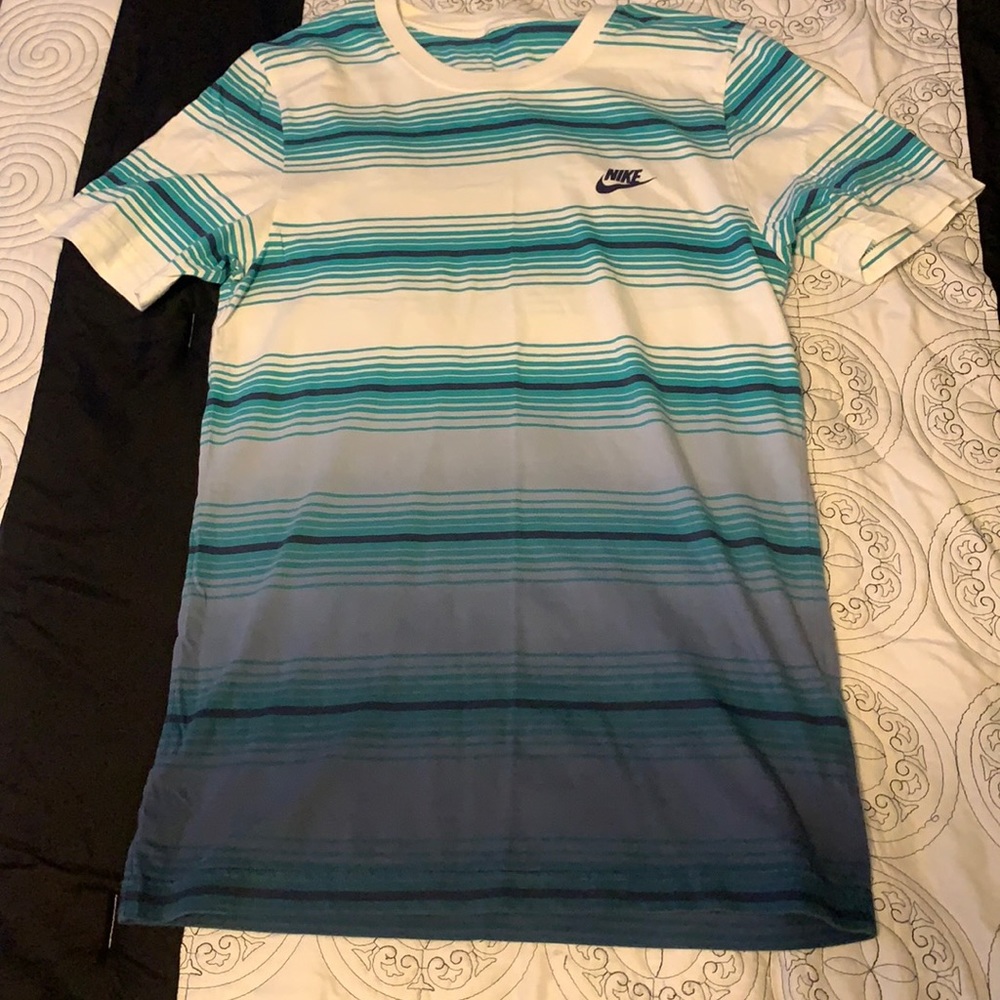 Teal Nike shirt